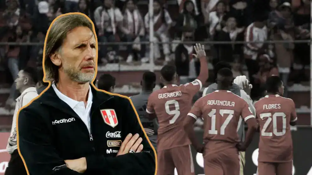 Entrenador de fútbol peruano en partido de selección nacional con jugadores celebrando Gol, en un estadio con audiencia, enfoque en liderazgo y pasión deportiva en Loreto Noticias.